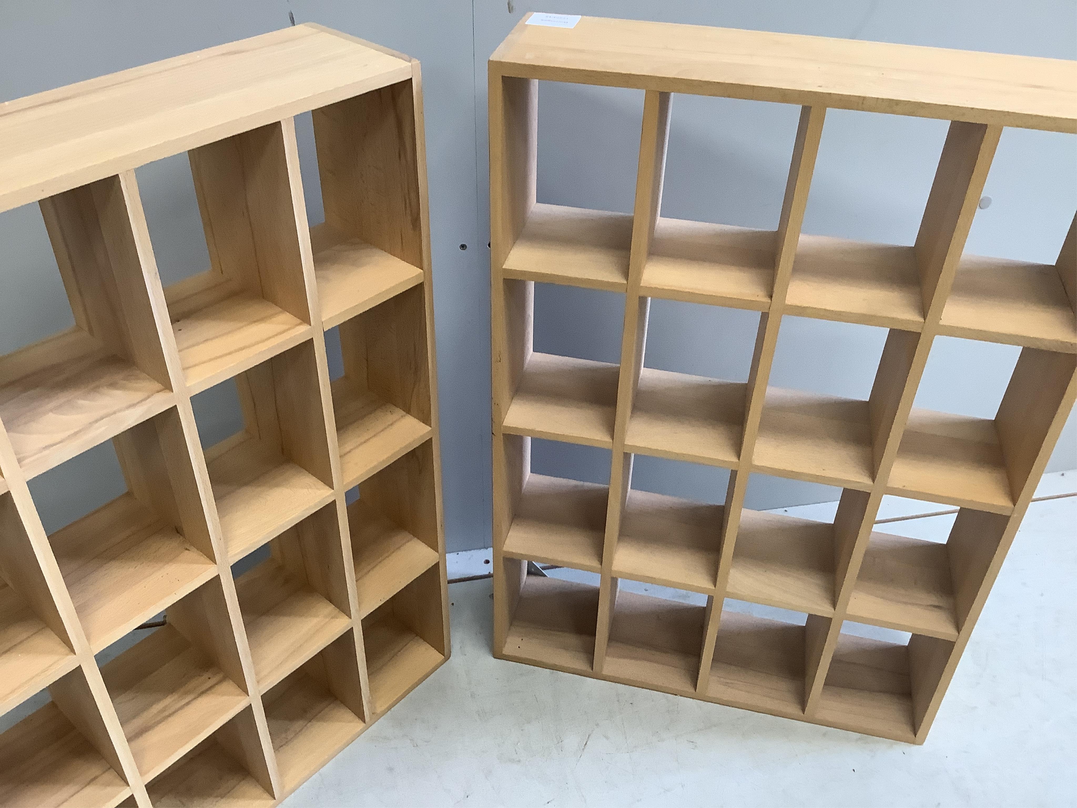 A pair of contemporary wooden pigeon hole wall units, width 49cm, height 70cm. Condition - good